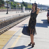 Vintage woman pinup waiting for train black heels dance shoes