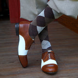 Closeup of Aris Allen Brown and Ivory Saddle Shoes