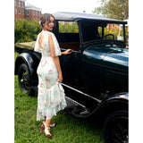 Beautiful woman next to classic car in Aris Allen Dance Heels